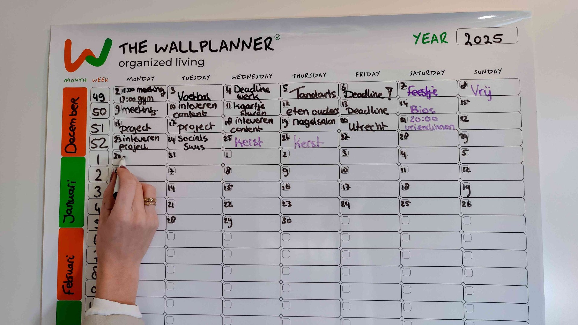 Detail van ingevulde Wall Planner met planning